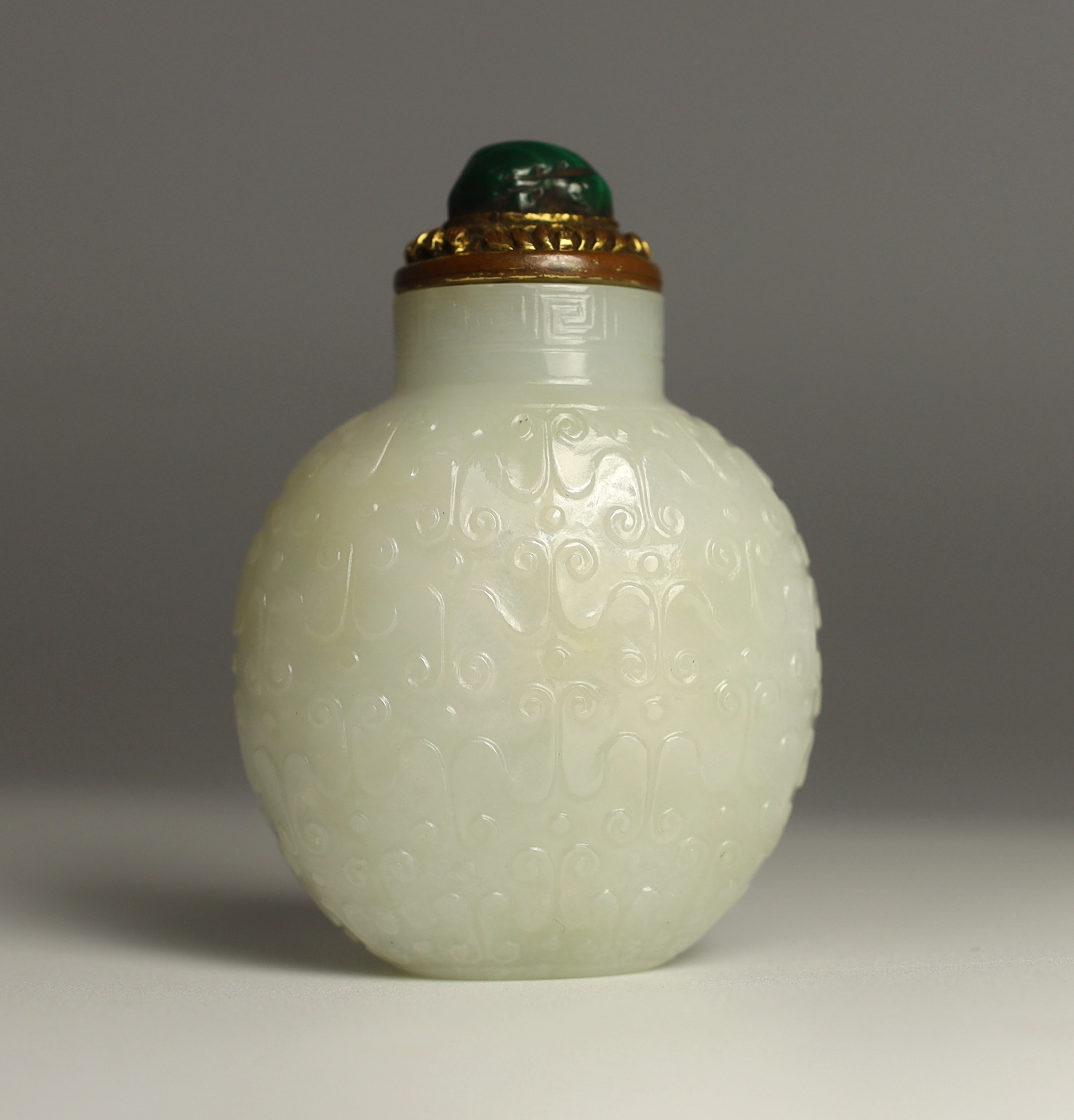 A good Chinese archaistic white jade snuff bottle, 1780-1850